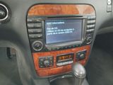 a picture of a car dashboard with a radio in it