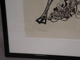 a black and white drawing of a shoe on a table