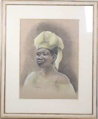 painting of a woman with a yellow turban in a gold frame