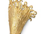 gold leaf wall sconce on a white wall with a white background
