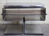 a metal shelf that has two shelves on top of it