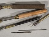 a lot of tools that are laying out on the table