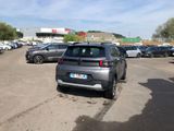 many cars parked in a parking lot in a parking lot