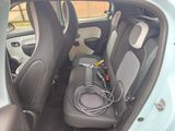 a car that has a hose in the back of it