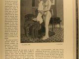 an open book with a picture of a naked woman on it