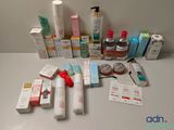 many different types of skin care products laid out on a table