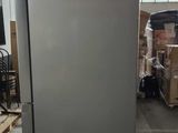 an image of a refrigerator in a warehouse
