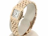 an image of a ladies ' s wrist watch on a stand