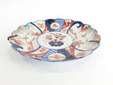 un bol bleu et orange orné d'un motif de tigre