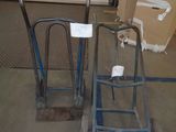 two hand trucks that are sitting next to each other