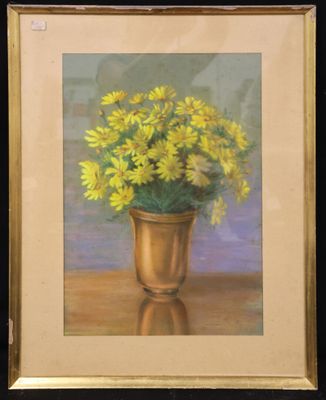 painting of yellow flowers in a gold vase on a table