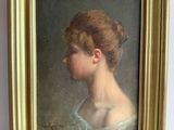 portrait of a young woman in a white dress in a gold frame