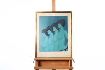 a painting on a easel with a painting of two women on it
