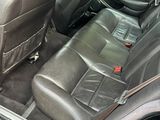 a picture of the interior of a car with the door open