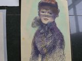 a drawing of a woman with a hat on and papers on the floor