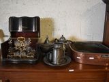 a wooden table topped with pots and pans on top of it