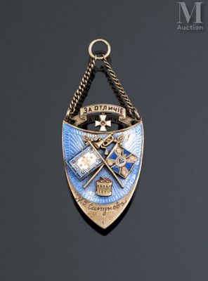 a close up of a badge on a chain on a black surface