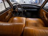 dashboard of an old car with leather seats and a steering wheel