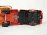 a toy truck that is sitting next to another toy truck