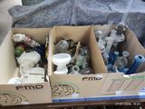 two boxes with different items in them sitting on a table