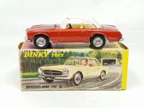 a toy car that is sitting on top of a box