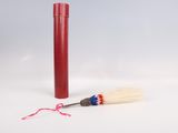 a red tube with a white handle and a red and blue brush