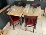 many empty wine glasses on the table in the room