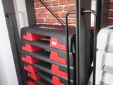 a stack of pizzas sitting on top of a metal rack