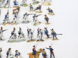 a lot of figurines that are on a table