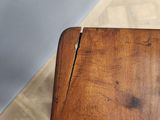 a close up of a piece of wood on a table