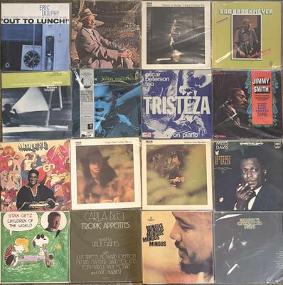 a lot of records on the wall of a room