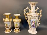 three vases sitting next to each other on a table