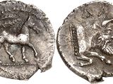 a close up of a coin with a bull on it