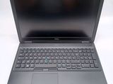 the laptop is open and ready to be used on the desk