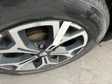 a close up of a tire on a car