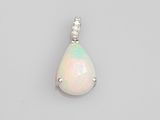 an oplite and diamond pendant