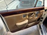 a car door open with the driver ' s side door open