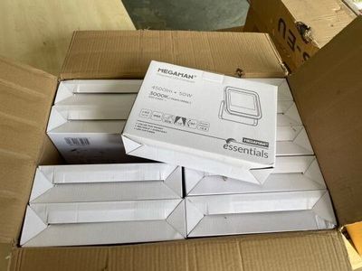 a cardboard box with a bunch of electronic items inside of it