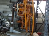 a machine that is sitting on a pallet in a garage
