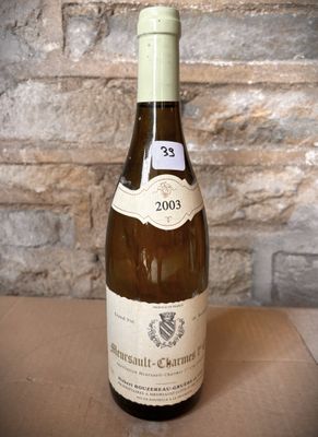 a bottle of wine that is sitting on a table