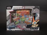 La boîte est ouverte pour montrer le contenu du jeu de cartes à collectionner Pokémon.