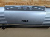 a toaster that is sitting on top of a piece of paper