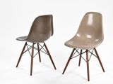 pair of mid century eames side chairs with wood legs