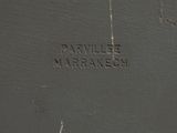 a close up of a sign on the side of a building