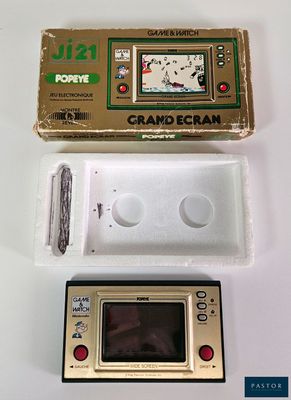a small game console with a game in it
