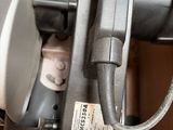 a close up of a machine with a cord attached to it