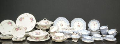 many different types of plates and bowls on the table