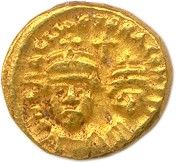 une pièce d'or portant l'image d'un homme