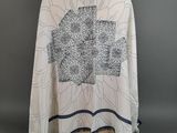 a white shirt with a black and white design on it
