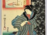 an image of a woman in a kimono sitting on the floor